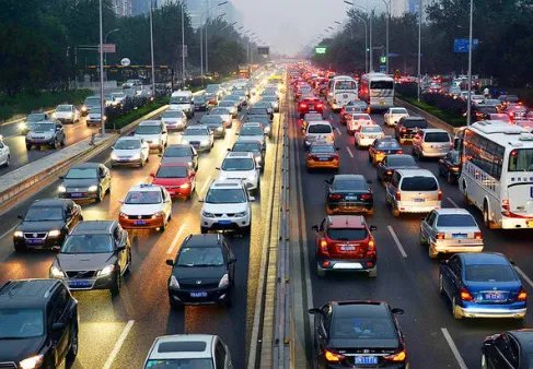 国庆节高速公路免费是按上高速时间算,还是下高速时间算